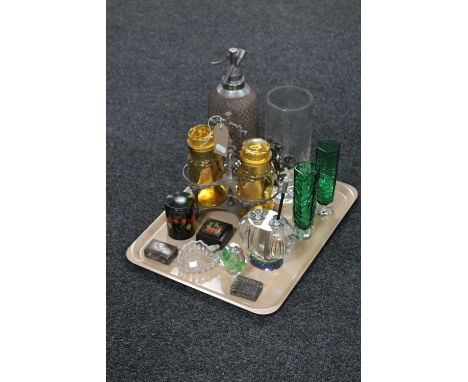 A tray of antique plated two bottle tantalus, assorted glass ware, trinket pots, match book holders, vintage soda syphon etc 