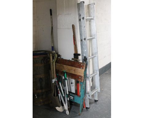 A set of extending aluminium ladders together with a folding black and decker work mate and quantity of tools 