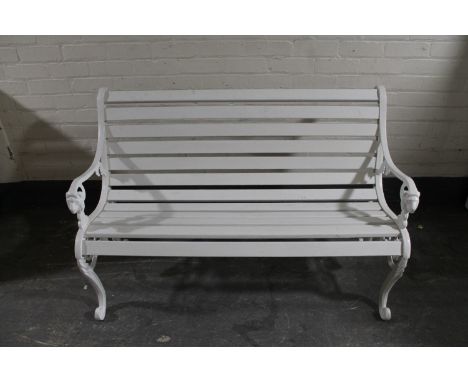 A cast iron wooden slatted garden bench 