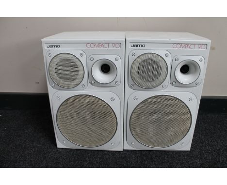 A pair of white Jamo compact 90 wall speakers 