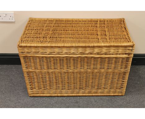 A wicker laundry hamper 