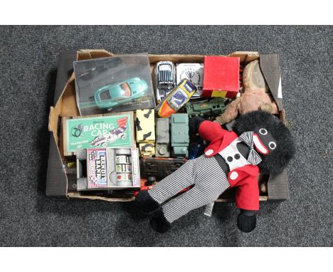 A box of die cast and military vehicles, Scalextric racing cars, golly etc 