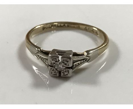 An early twentieth century diamond set 9ct and palladium mounted ring, 1.6g, size K.