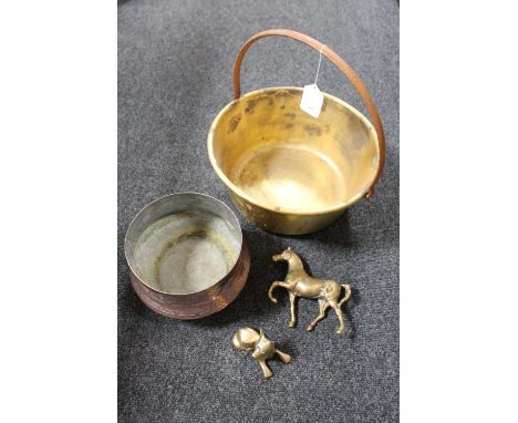 A vintage brass jam pan with cast iron handle together with a copper embossed planter and two brass figures of a horse &amp; 