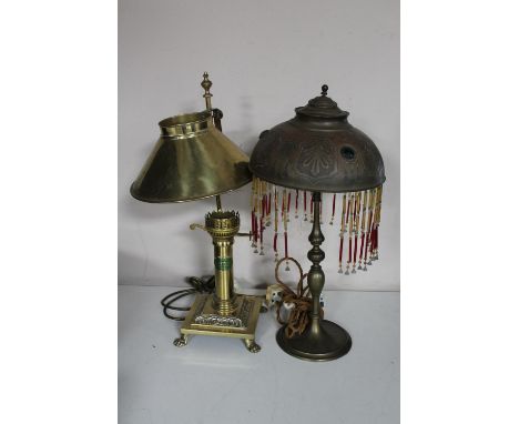 An adjustable brass duplex oil lamp with shade (electric converted) and a copper Art Deco table lamp with drops 