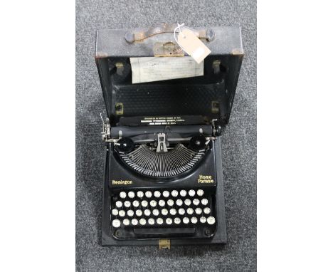 A vintage cased Remington home portable typewriter 