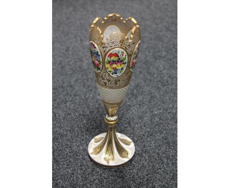 A Victorian gilded enamel vase with six floral panels, height 30 cm
