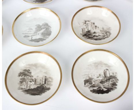 A Spode bat printed part tea service, circa 1815, with rural views and gilt rims, pattern no. 557, comprising eleven tea cups