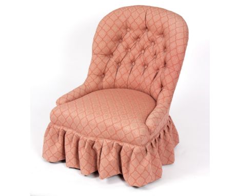 A Victorian button back chair on turned front legs/Provenance: Beverston Castle