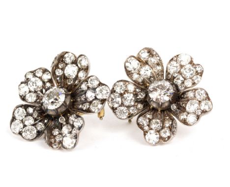 A pair of 19th Century diamond flowerhead cluster ear clips, the clips of later manufacture, the central stones approximately