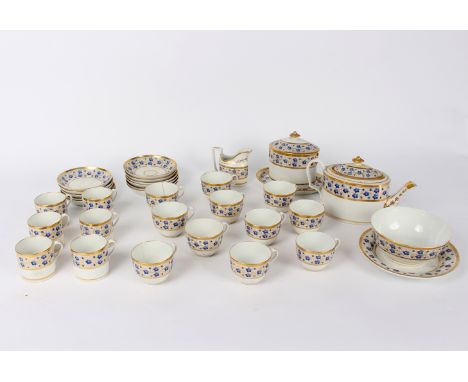 A English porcelain tea service, circa 1810, with a wide blue and gold floral border, comprising: an oval teapot, cover and s