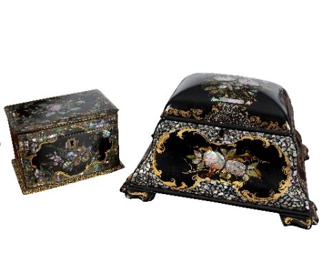 A Victorian papier-mâché tea caddy, the domed cover enclosing two lidded compartments, the top and sides decorated flowers in