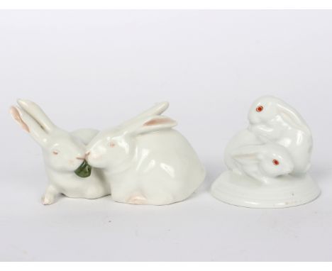 A Royal Copenhagen model of a seated fox, another of two rabbits and a Herend group of two rabbits, 15cm high/Provenance: Bev