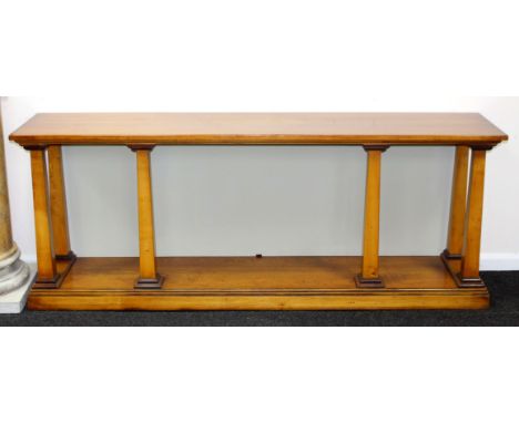 A modern console table with four square taper supports to the front, 198cm wide