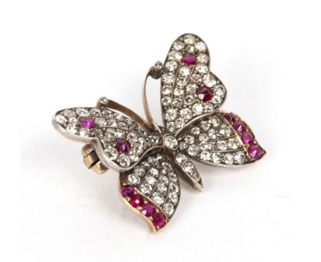 A ruby and diamond butterfly brooch, 2.5cm wide/see illustration/Provenance: Beverston Castle Condition Report: 113:Silver on