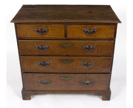 An 18th Century oak chest of two short over three long drawers, on bracket feet, 78cm wide