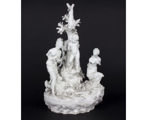 A Derby biscuit group, circa 1780, of Three Graces and Cupid around a central tree trunk, incised mark no.135, damages, 41cm 