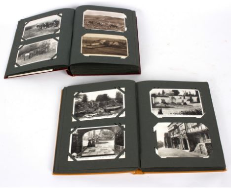 Two postcard albums, including R P examples, Coniston Foxhounds, Lake District, Bude, Dartmoor Ponies, Lynmouth, Shipping, Ch