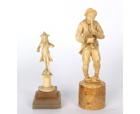 A 19th Century carved ivory figure of a peasant playing a pipe, 14cm high and another carved ivory figure of a courtier, 11cm