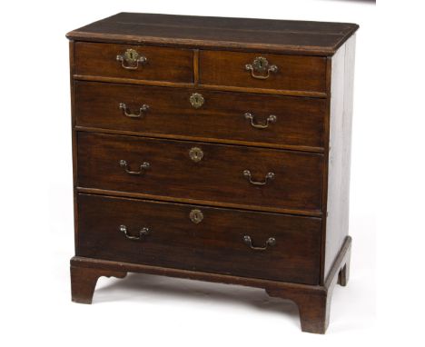 A late 18th Century oak chest of three long and two short drawers, on bracket feet, 86cm wide/Provenance: Beverston Castle