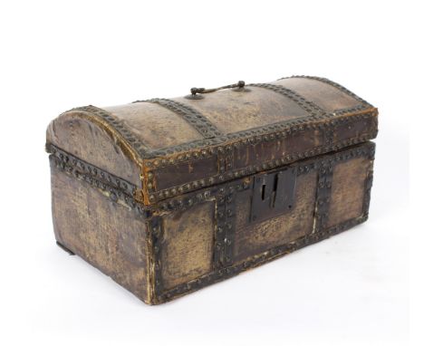 A Georgian pig skin covered trunk, the domed cover with brass handle, studded borders, 40.5cm wide