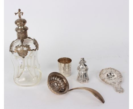 A Continental 800 standard silver mounted hour glass decanter, 23cm high, a continental salt modelled as a Dutch girl, 7.5cm 