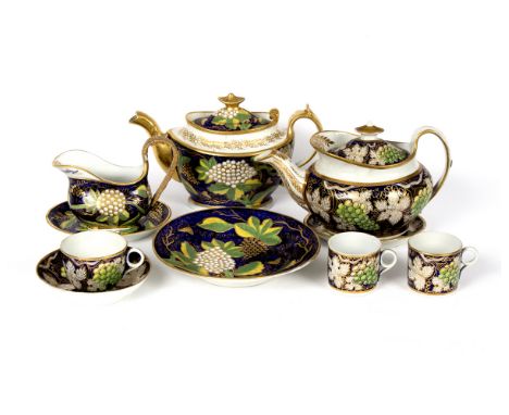 A New Hall part tea and coffee service, pattern 779, circa 1810, printed and gilt with grapes and vine leaves on a blue groun