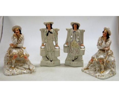 A pair of Victorian Staffordshire flatback figures of milkmaids, h.23cm; together with a pair of Continental porcelain figura
