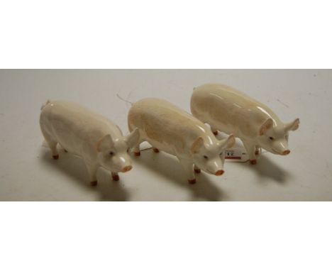 Two Beswick figures of sows, Champion and Wall Queen 40, model No.1452A; together with another Beswick pig, Champion Wall Boy