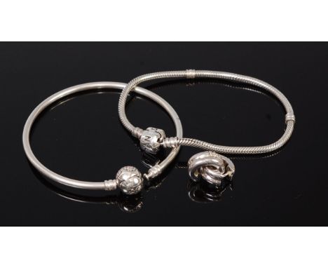 A Pandora silver bangle and bracelet, and a pair of TiSento silver ear studs (3)