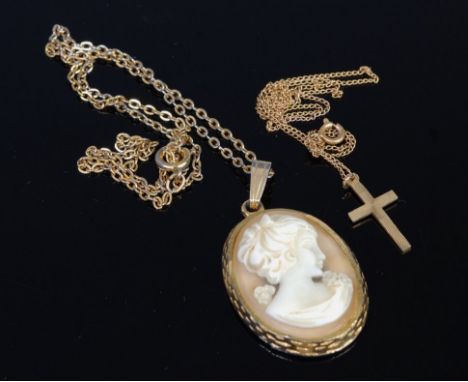 A 9ct gold cross pendant on finelink neck chain 1.3g, together with a gilt metal carved shell cameo pendant (2)
