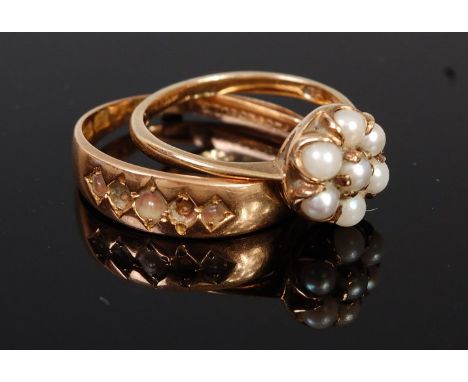 A 15ct gold seed pearl set band ring (some losses) together with a 9ct gold seed pearl cluster ring, gross weight 4.1g (2)