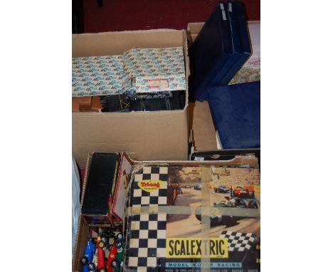 A boxed Triang Scalextric motor model racing set and accessories ***together with a quantity of collectors plates***