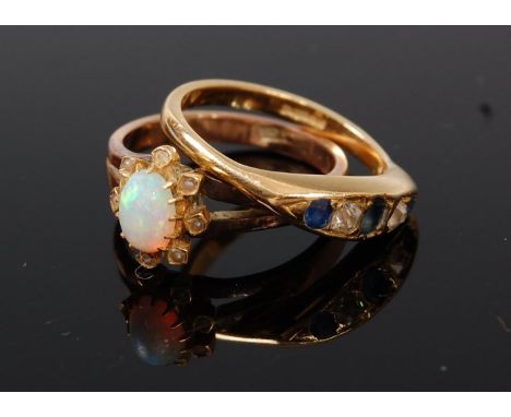 An 18ct gold sapphire and diamond five stone ring, size M together with a 9ct gold opal set dress ring (2)