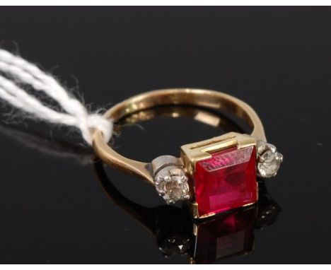 An 18ct gold synthetic ruby and diamond set dress ring, the old cut diamonds each weighing approx. 0.1ct, 2.9g, size K/L