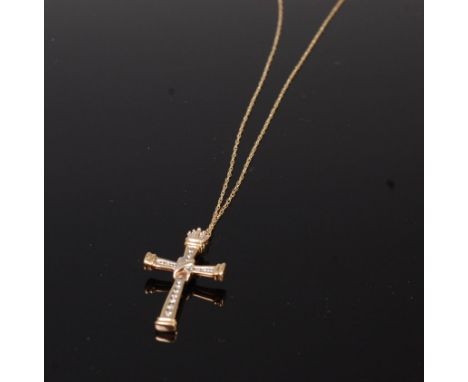 A 9ct gold and diamond set cross pendant, the arms channel set with small graduated brilliants, the top surmounted with five 