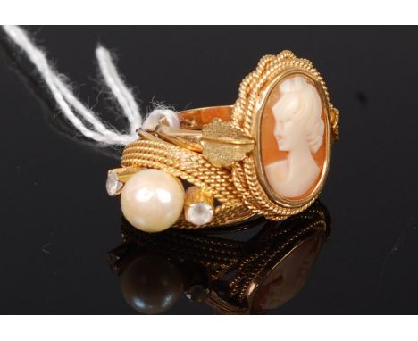 An 18ct gold and carved shell cameo ring together with a yellow metal cultured pearl and white sapphire set dress ring, gross