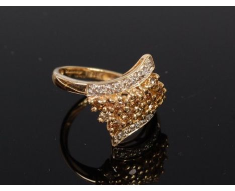 A modern 9ct gold multi-diamond set dress ring by QVC, arranged as four rows of small brilliants (one stone missing), 3g, siz