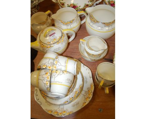 An early 20th century Tamsware six place setting tea service in the Charnwood pattern