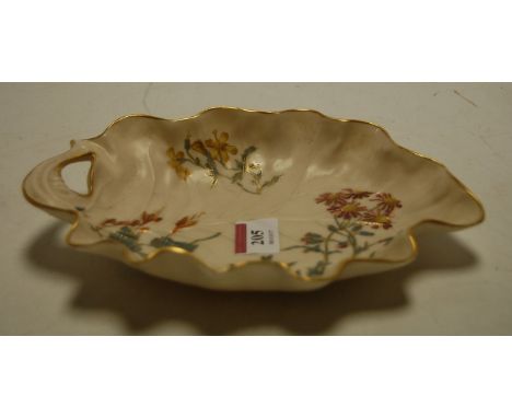 A circa 1890 Royal Worcester leaf dish with floral decoration within gilt borders having puce mark verso, shape number 1414, 