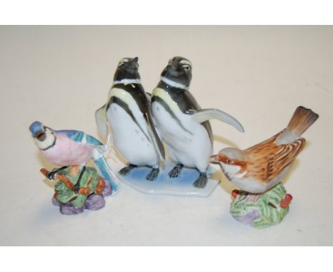 A Royal Worcester bone china blue jay, No.3646; together with a sparrow, No.3236; and a Kaiser of Germany porcelain penguin g
