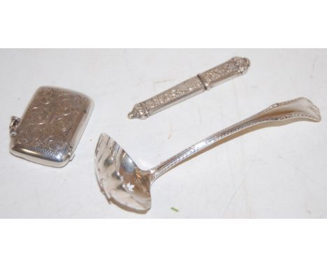 A circa 1900 silver vesta, having all-over foliate engraved decoration; together with an Edwardian small pierced silver ladle