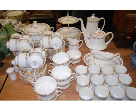 A Royal Albert twelve place setting tea and dinner service, in the Belinda pattern