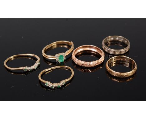 Two 9ct gold and embossed wedding bands, 3.7g, together with three 9ct gold and diamond point set rings (all badly misshapen)