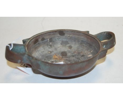 A 20th century bronze twin handled korro (lacking cover) width 20cm