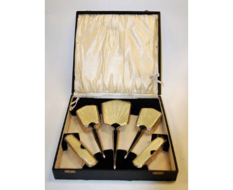 An Art Deco faux enamel and silver plated five-piece dressing table set, in original fitted box