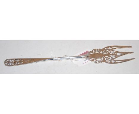 A late Victorian silver fish fork, having pierced decoration, by Robert Pringle 