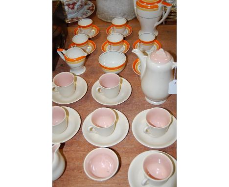A Myott & Sons Art Deco hand painted six place setting tea service, No. 8087, printed mark verso, together with a Clarice Cli