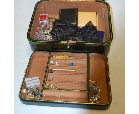 A green Moroccan leather clad jewellery box and contents, to include; gilt metal propelling pencil with engine turned decorat