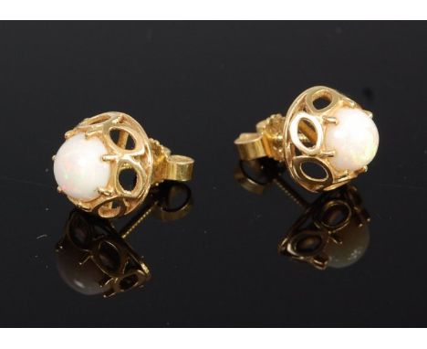 A pair of 18ct gold  and cabochon opal set ear studs with screw down backs, 3.5g, dia. 11mm